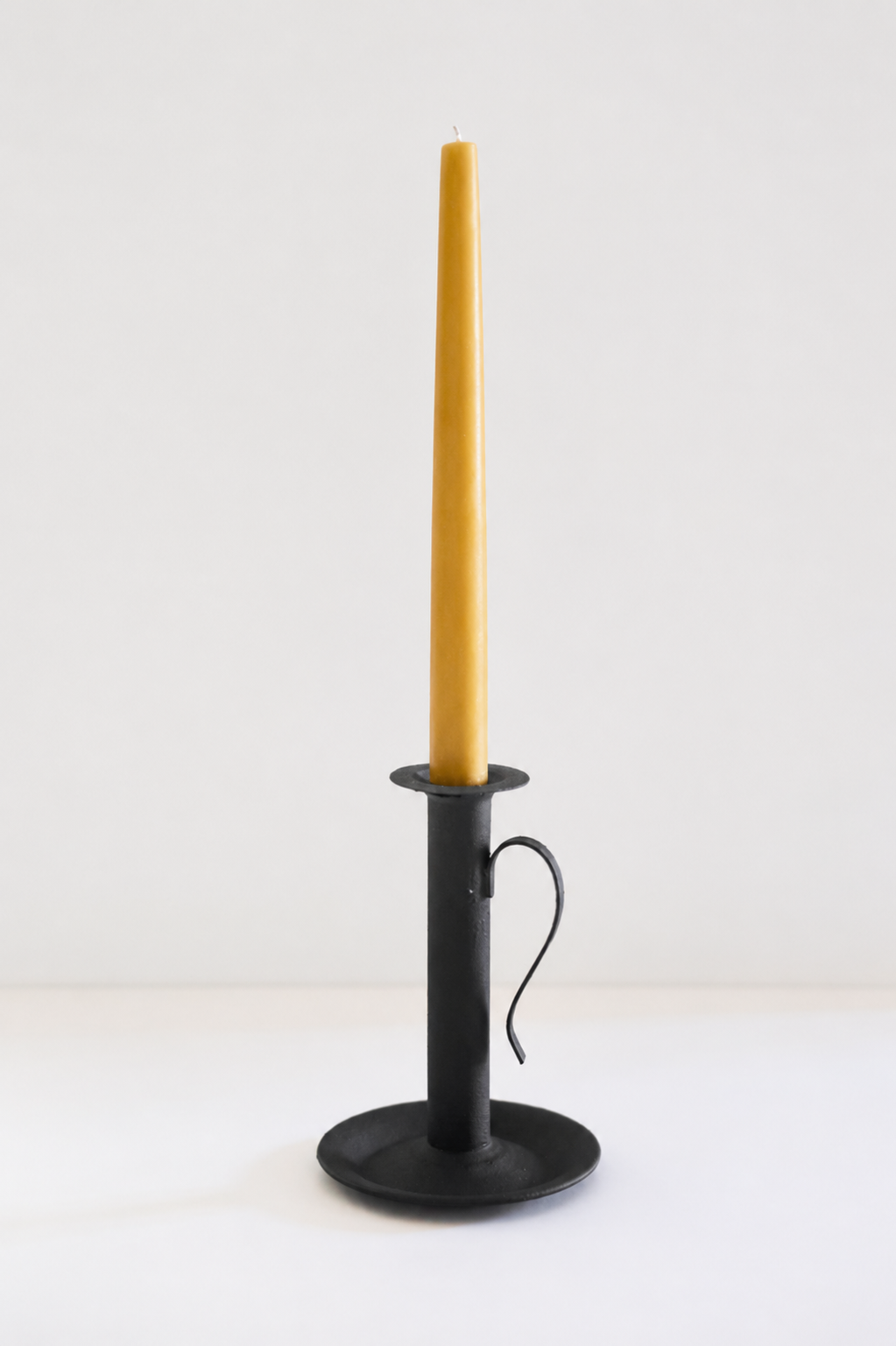 The Tall Candlestick Holder